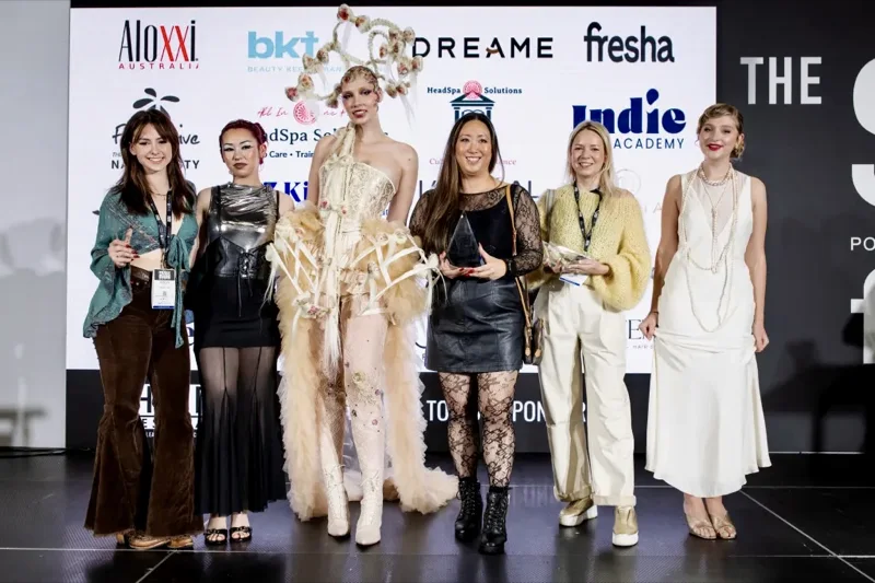 Yulia Kuzmina receiving 1st place at Hair Festival Instyle Style Icons 2026 Bridal Master