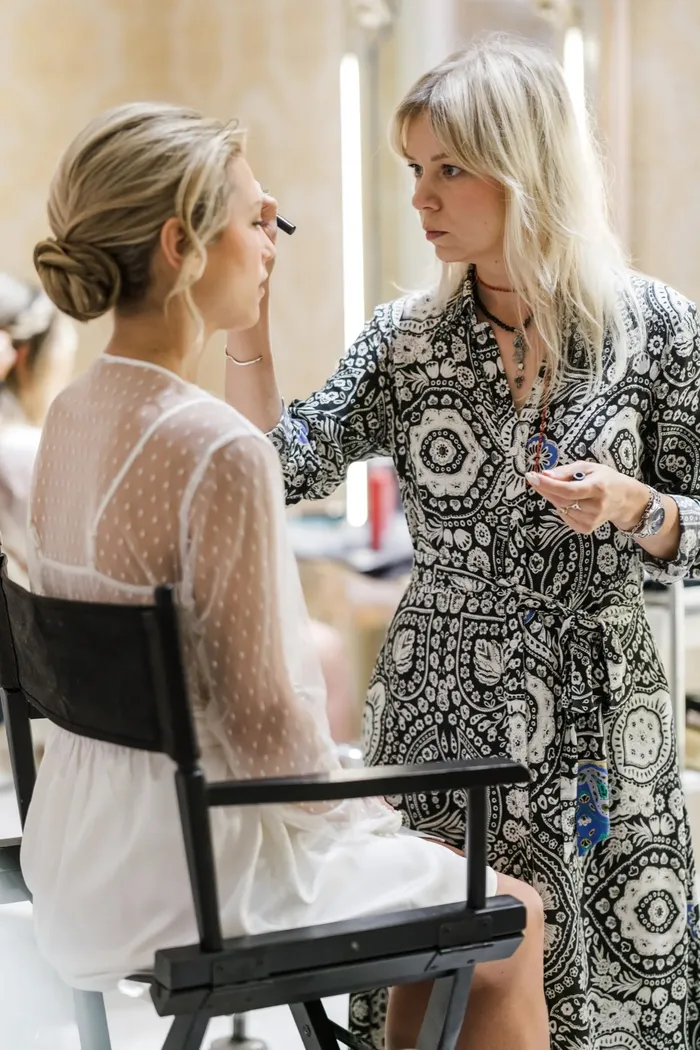 Yulia Kuzmina styling a bride for her wedding in the Southern Highlands